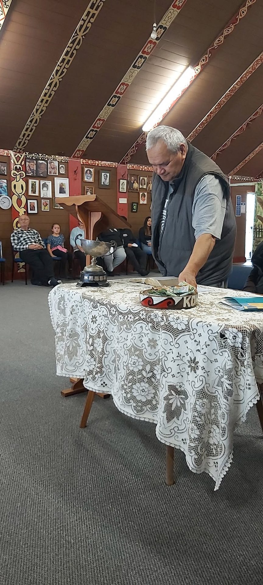 A speaker sharing kōrero at a hui