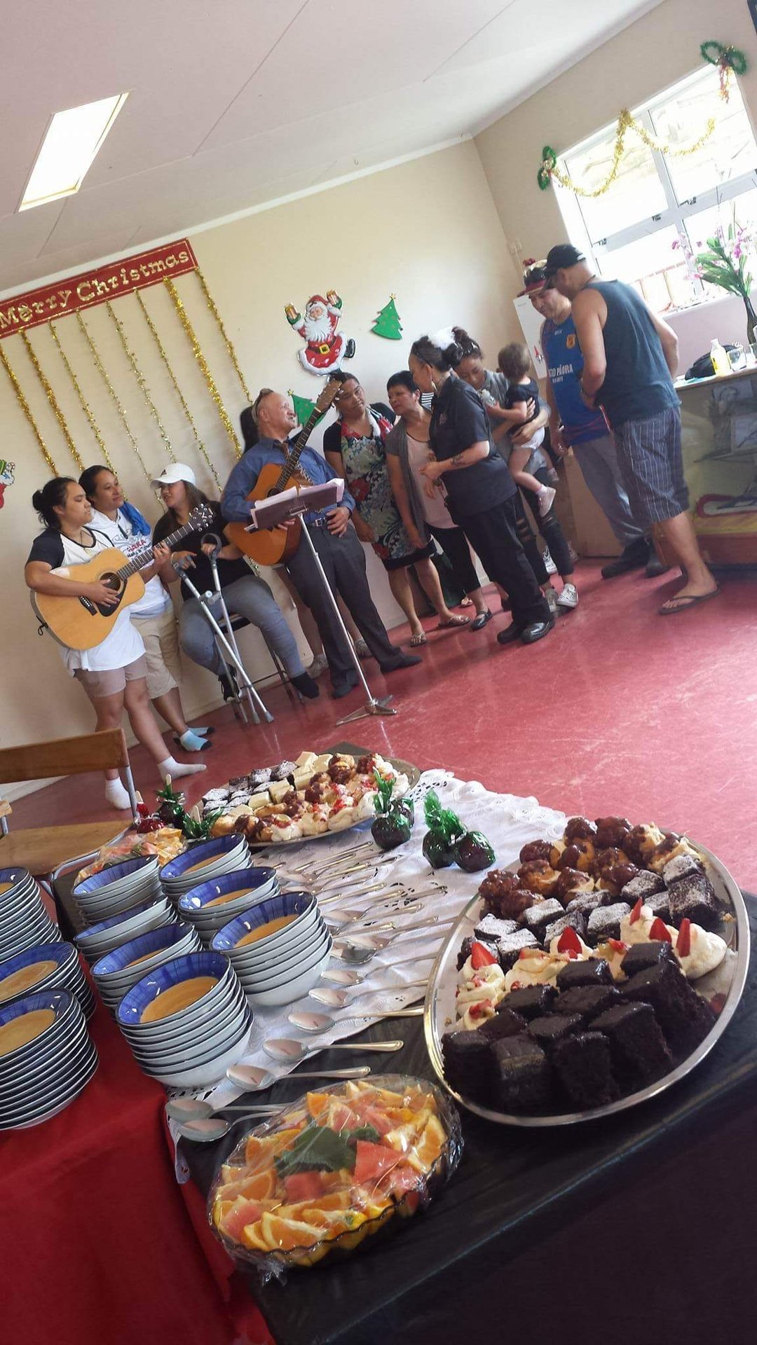 Whānau singing together at the marae.